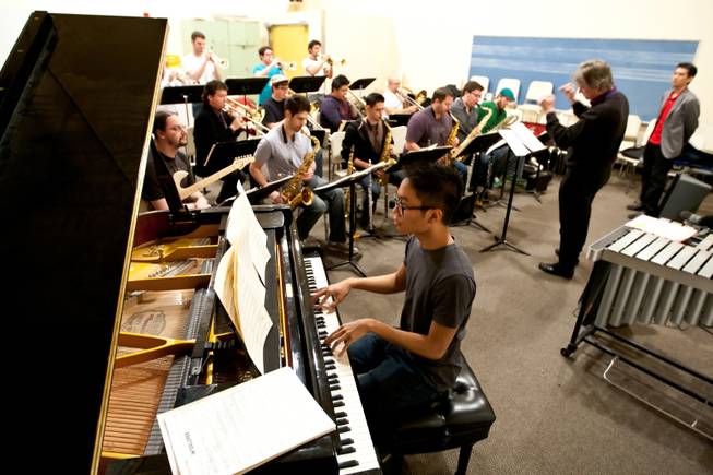 Led by Co-directors Dave Loeb and Nathan Tanouye (right), pianist Jason Corpuz, 19, joins fellow students of the UNLV Jazz ensemble in rehearsal for an upcoming performance on the UNLV Campus as the UNLV Jazz program reaches its 40th anniversary in Las Vegas Friday, March 1, 2013.